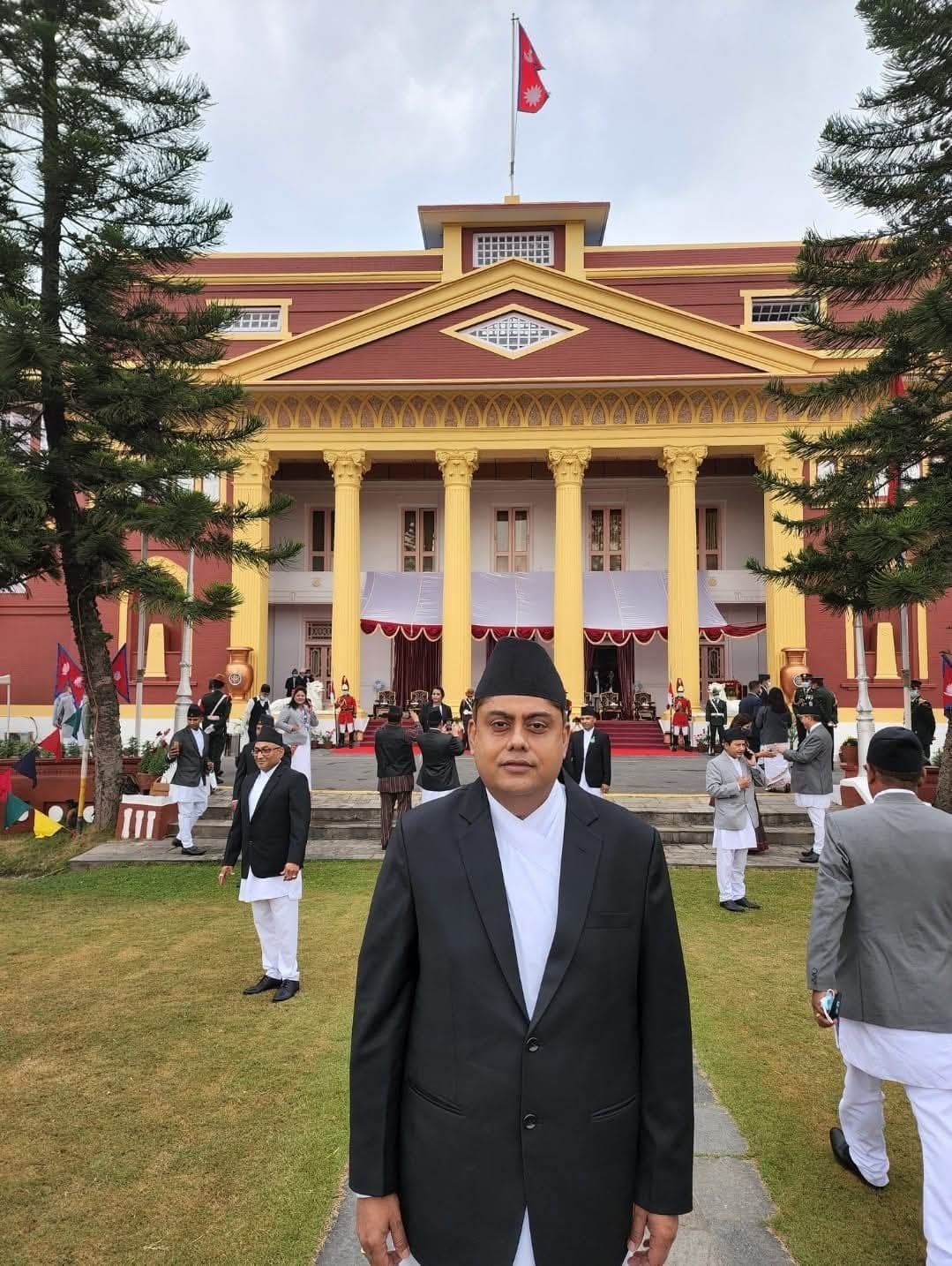Dr. Niraj Kumar Singh in formal Nepali dress outside the ceremonial venue in Kathmandu on the day of the investiture.